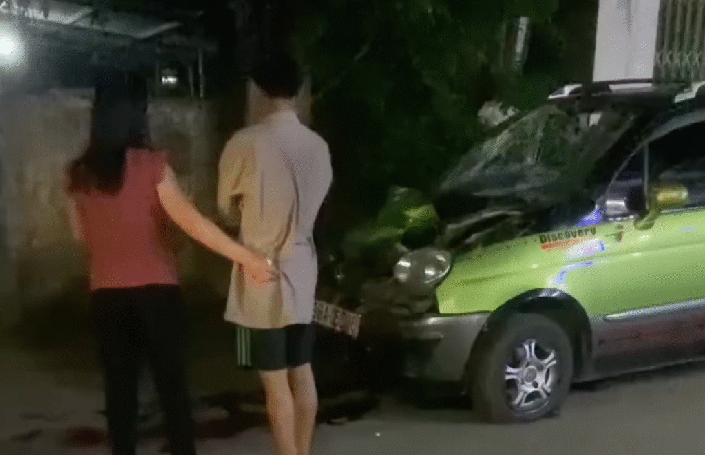 Car crashes into the back of a parked truck
