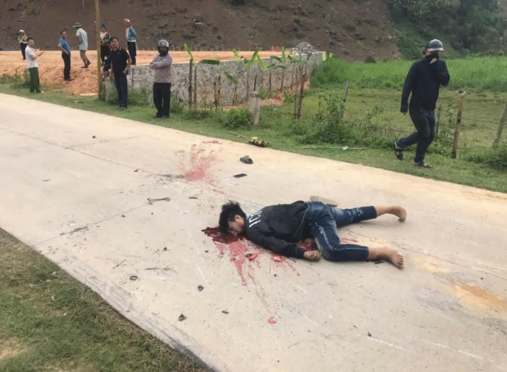 Aftermath of a crash between a truck and a motorbike: 1 dead