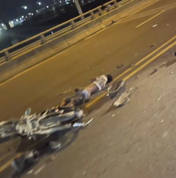 Head-on collision between a motorbike and a truck at night - 2