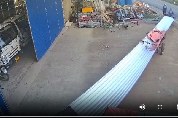 A motorbike is going too fast to see the long piece of metal